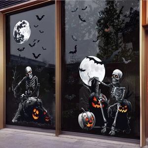 Halloween window stickers featuring skeletons on pumpkins with glowing lanterns and bats