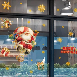 Christmas window decals with Santa Claus in hot air balloon and golden snowflakes