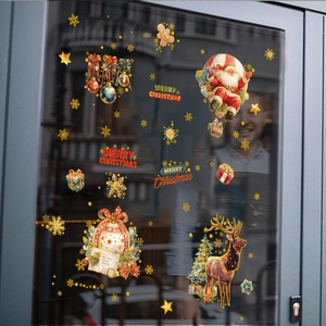 Christmas window decals with Santa in a hot air balloon, reindeer, and snowflakes