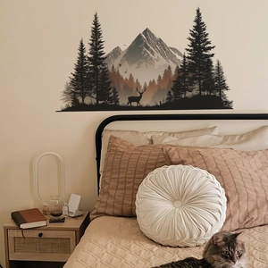 3D snowy mountain and pine forest wall sticker with deer silhouette in bedroom setting