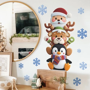 Christmas wall stickers featuring Santa, reindeer, and penguin with blue snowflakes