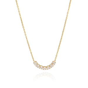 Collar dorado brillante con siete piedras de circonita dispuestas en un arco delicado