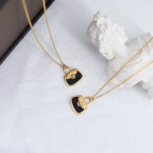 Quilted black PU leather bag pendant necklace in 18K gold plated stainless steel
