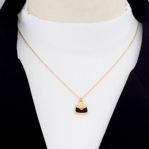 Chic quilted black mini bag pendant on golden 18K plated stainless steel necklace chain
