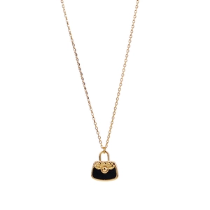 Elegant 18K gold-plated necklace featuring a black quilted purse pendant with vintage flair