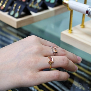 Minimalist square champagne zircon rings in gold and silver finish on hand