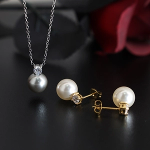 Elegant grey pearl necklace and white pearl studs set with gold plated titanium steel