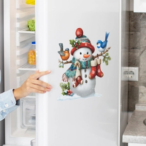 Christmas snowman wall sticker featuring birds and berries on a white refrigerator