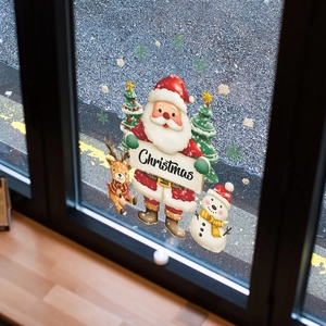 Watercolor Christmas window clings featuring Santa, reindeer, and snowman for glass decor