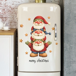 Cartoon Christmas gnomes and stars wall decals on a retro white fridge for home decor