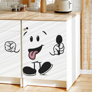 Cartoon hungry face kitchen wall decal with big eyes and spoon on white cabinet