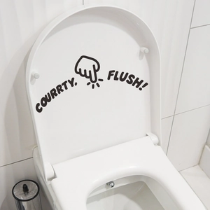 Creative black vinyl toilet lid sticker with COURRTY FLUSH text and finger icon