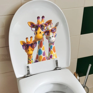 Cartoon giraffes wearing sunglasses printed on white toilet lid in a bathroom