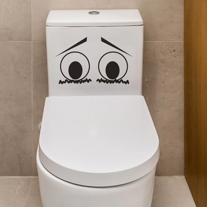 Minimalist cartoon sad face toilet lid sticker with black expressive eyes and eyebrows