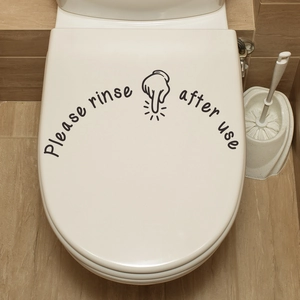 Minimalist 'Please rinse after use' toilet sticker with hand icon on a white lid