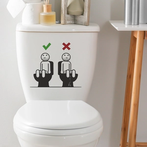 Funny toilet etiquette sticker showing correct sitting posture on a white ceramic tank