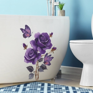 Purple rose and butterfly wall stickers on white bathtub in a modern bathroom