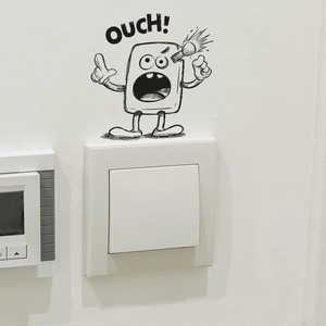 Black cartoon OUCH monster light switch sticker for minimalist wall decoration