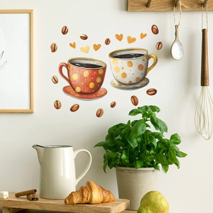 Adesivi murali cucina con tazzine da caffè, chicchi e cuori su una parete bianca