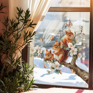 Self-adhesive wall decal featuring squirrels and flowers on a blooming pear branch