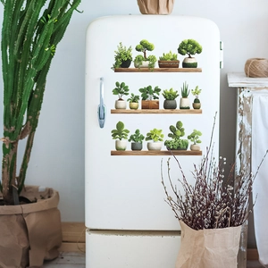 Trois rangées de stickers muraux de plantes vertes sur fond de réfrigérateur blanc rétro