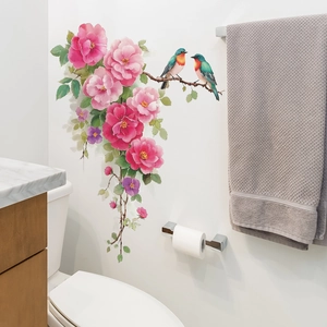 Floral wall sticker with pink roses and colorful birds in a modern bathroom setting