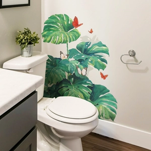 Monstera leaf and butterfly wall decals in a modern bathroom scene for home decoration