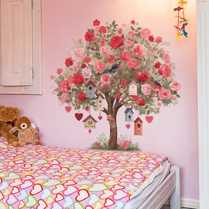 Floral wall sticker featuring a blooming tree with birdhouses and hearts for home decor