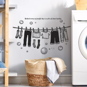 Minimalist laundry room wall decal featuring clothesline and bubbles on a laundry room wall