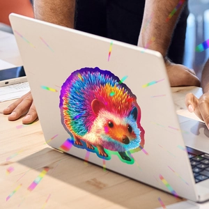 Holographic cartoon hedgehog wall sticker on laptop lid with a colorful rainbow laser finish