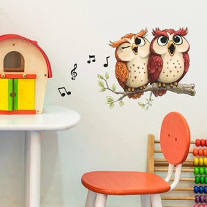 Cartoon singing owls wall sticker on leafy branch with music notes for nursery decor