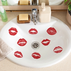 Red lipstick print wall stickers for bathroom decor on white ceramic basin