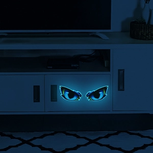 Luminous evil eye wall stickers with blue fluorescent eyes on cabinet for home decor