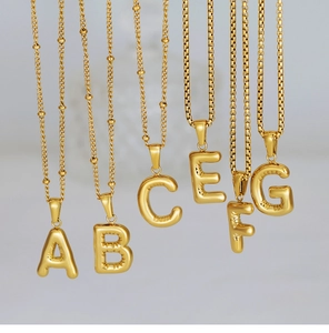 Polished 18K gold puff balloon initial pendants with box and bead chain detail