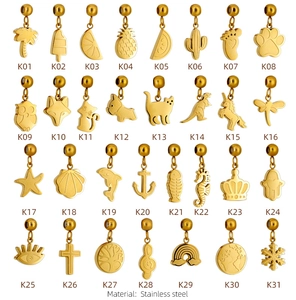Collection of 31 mini gold stainless steel charms including animals, plants and symbols