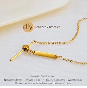 Close-up of golden stainless steel toggle clasp and rectangle tag for DIY jewelry making