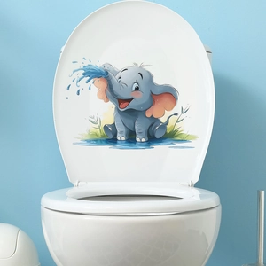 Cute cartoon elephant wall sticker for bathroom decor on a white toilet lid