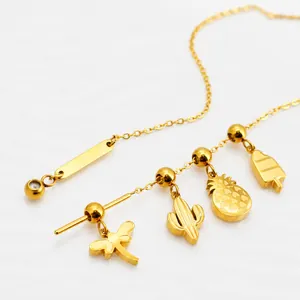 Golden DIY charm necklace with dragonfly cactus pineapple and popsicle shaped pendants