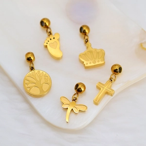 Golden DIY charms set featuring crown, paw, and tree of life for custom jewelry