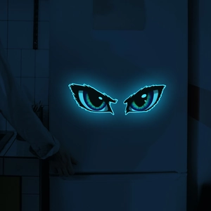 Luminous fierce eyes wall sticker glowing blue in dark kitchen for home decoration