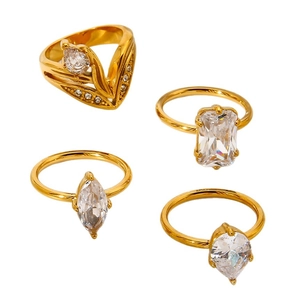 Set of four 18K gold plated stainless steel rings with zircon teardrop and V-shape designs