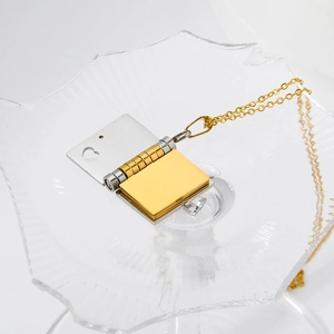 Y2K vintage titanium steel envelope book locket with heart cutout on gold chain