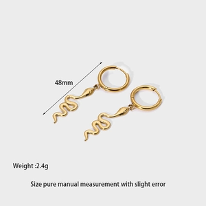 Detailed view of 14k gold plated snake hoop earrings with 48mm length and 2.4g weight