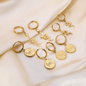 14k gold plated stainless steel snake and coin pendant hoop earrings set with diamonds