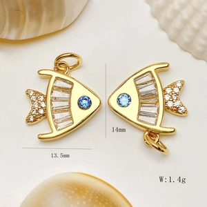 Macro shot of gold fish pendant with zircon inlay and detailed dimension specs