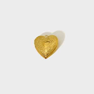 Vintage gold heart locket pendant with floral engraving and smooth center heart detail