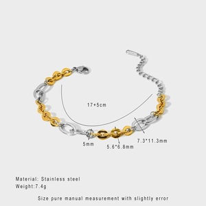 Detail view of two-tone stainless steel chain links with lobster clasp and extension