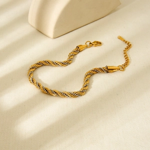 Two-tone stainless steel rope chain bracelet with 18K gold plating and silver bead accents