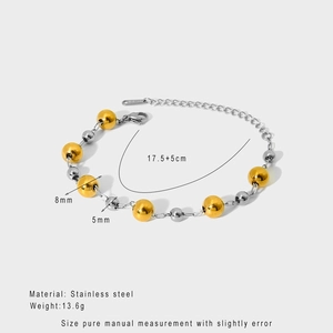 Detail of 18k gold and silver stainless steel bead bracelet with size measurements