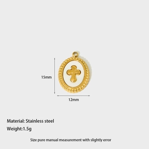 Detailed view of 15x12mm golden stainless steel cross pendant with white enamel inlay
